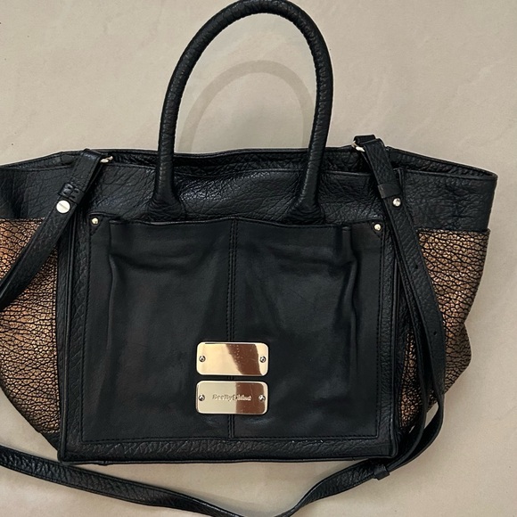 See By Chloe Black and Brown Totes with Sleek Finish - Picture 1 of 3